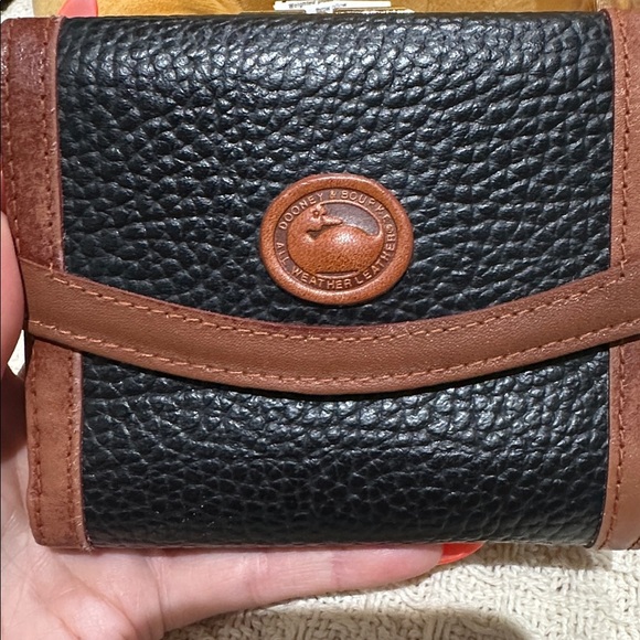 Dooney & Bourke Vintage
AWL Kiss Lock Wallet
Black and Brown Leather Wallet - Picture 7 of 7